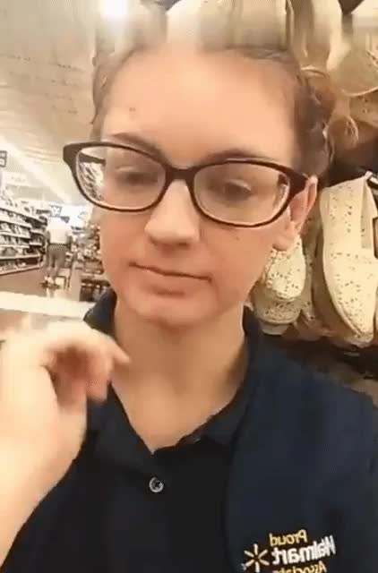 [GIF] Cute girl with glasses gives us a very risky flash at work