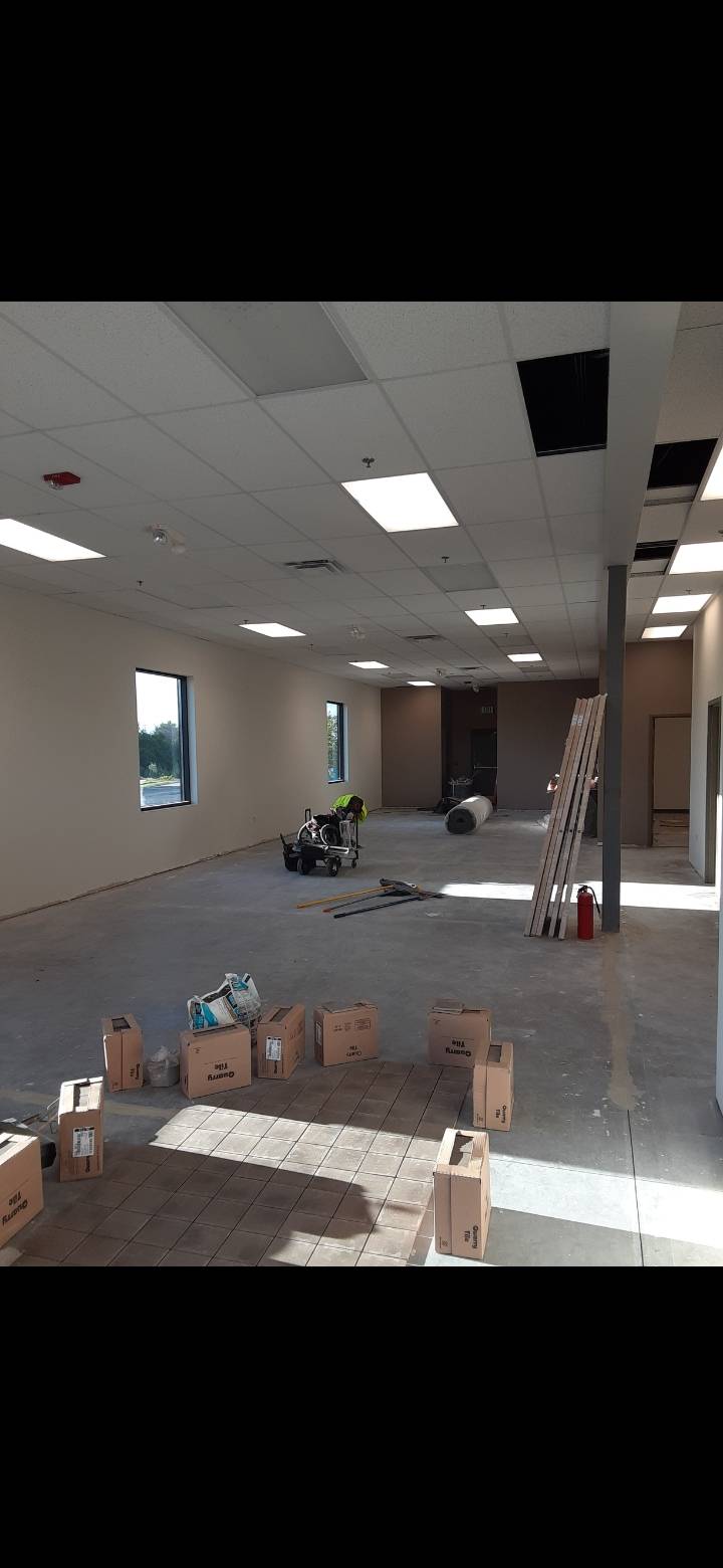 half way through the quarry tile and ready to glue carpet down