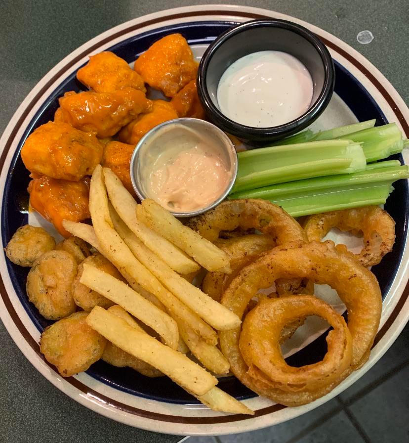 Homemade boneless Buffalo wings, beer battered onion rings, fried