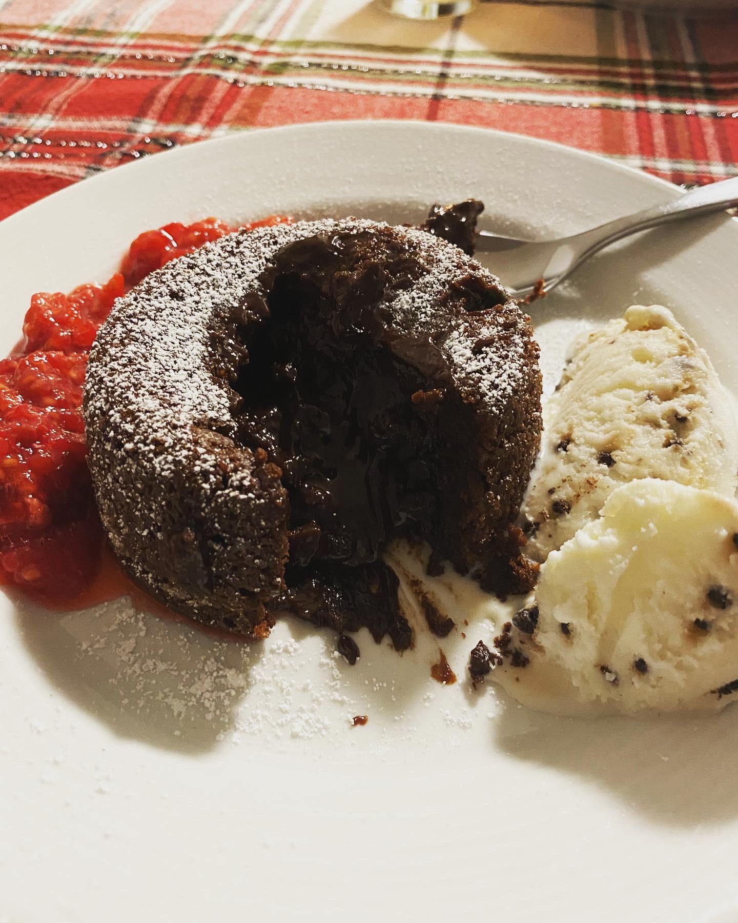 Homemade Chocolate Lava Cake With Raspberry Sauce And Ice Cream Scrolller