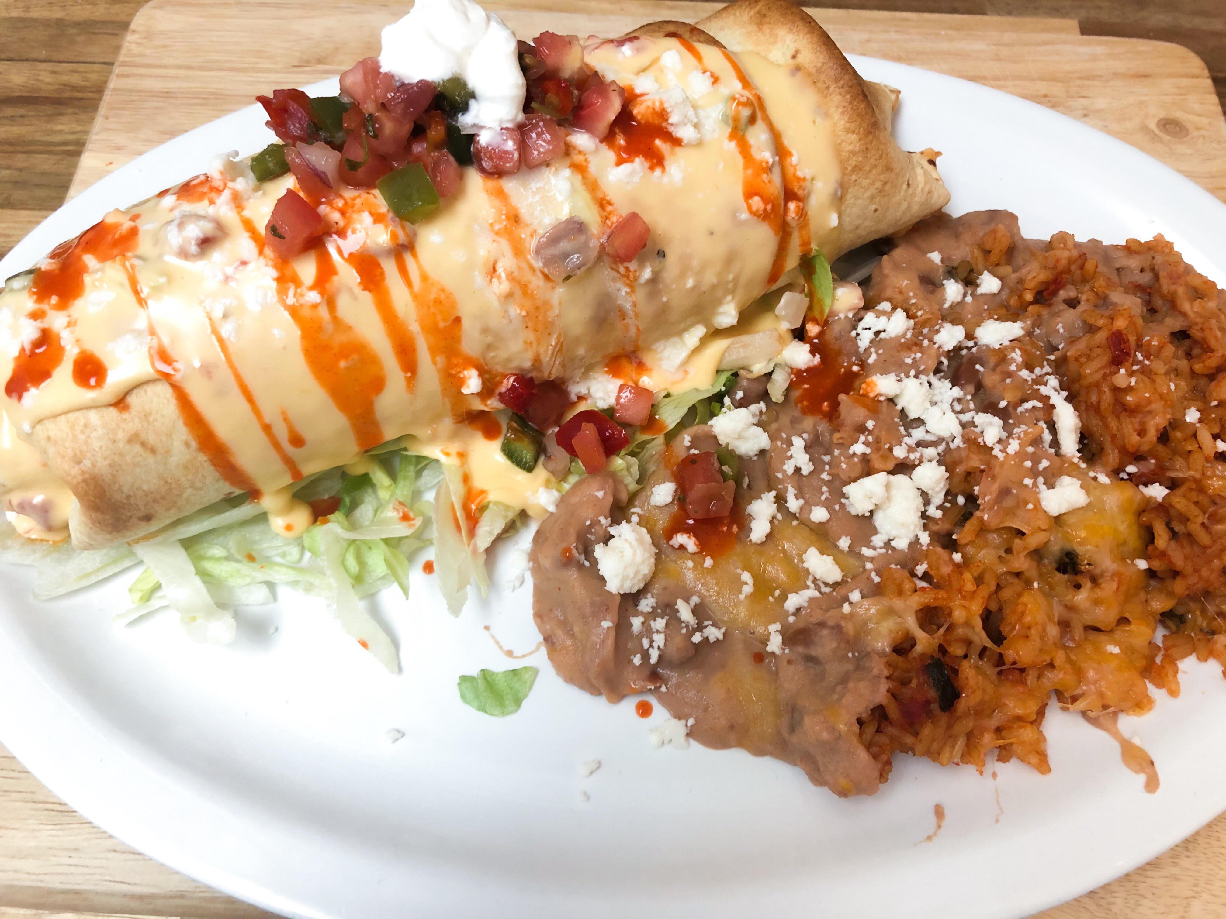 [Homemade] Ovenbaked chicken tinga chimichanga with queso and pico de