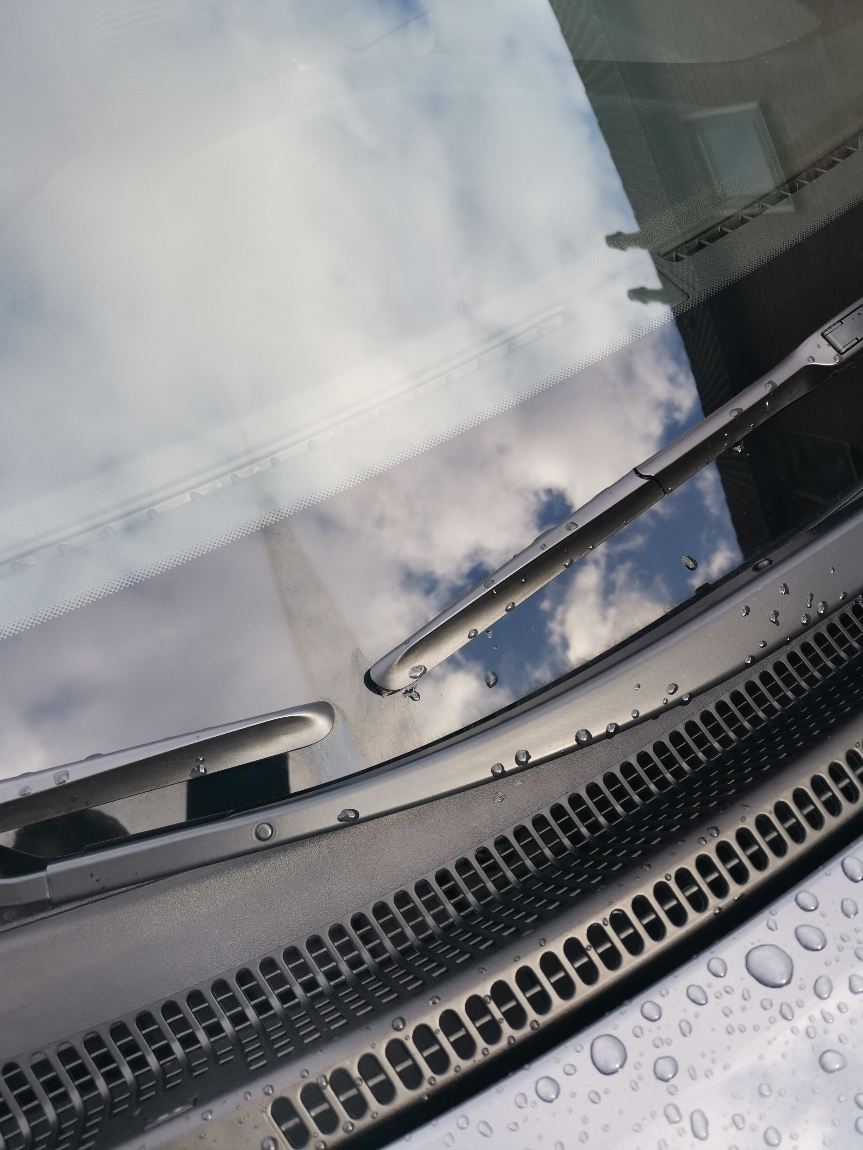 How can I remove this? Cleaning the windshield didn't work. Scrolller