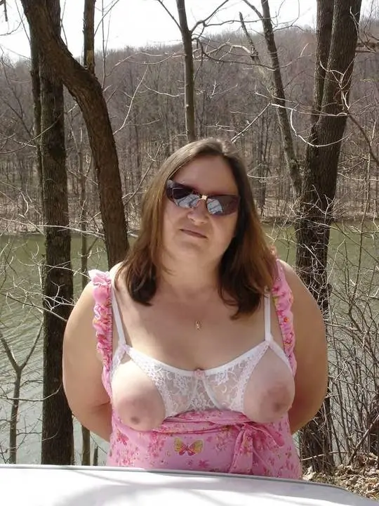 Busty brunette woman in open tip nursing bras showcasing big nipples and prominent areolas
