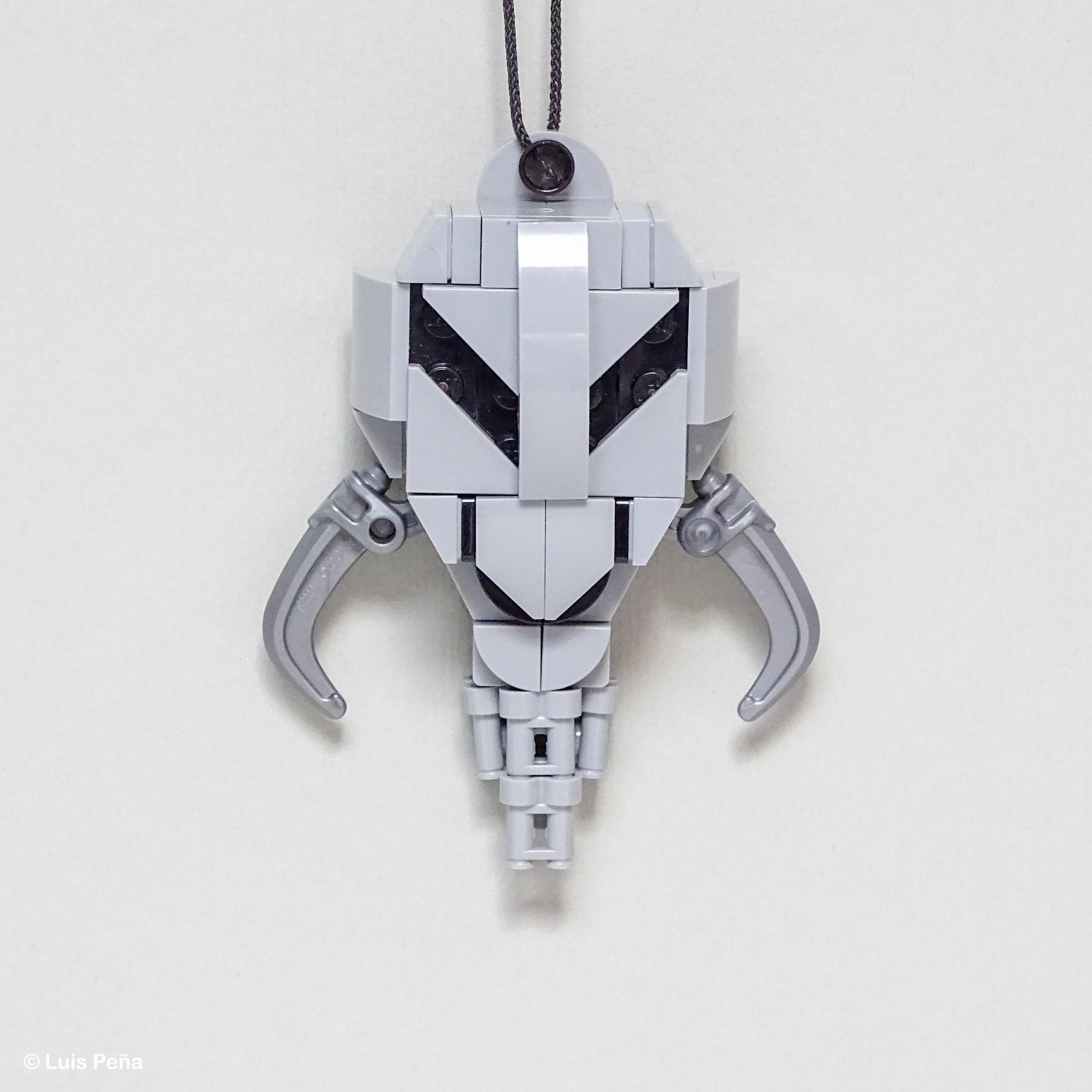 I built this Mythosaur Skull Pendant with LEGO pieces | Scrolller