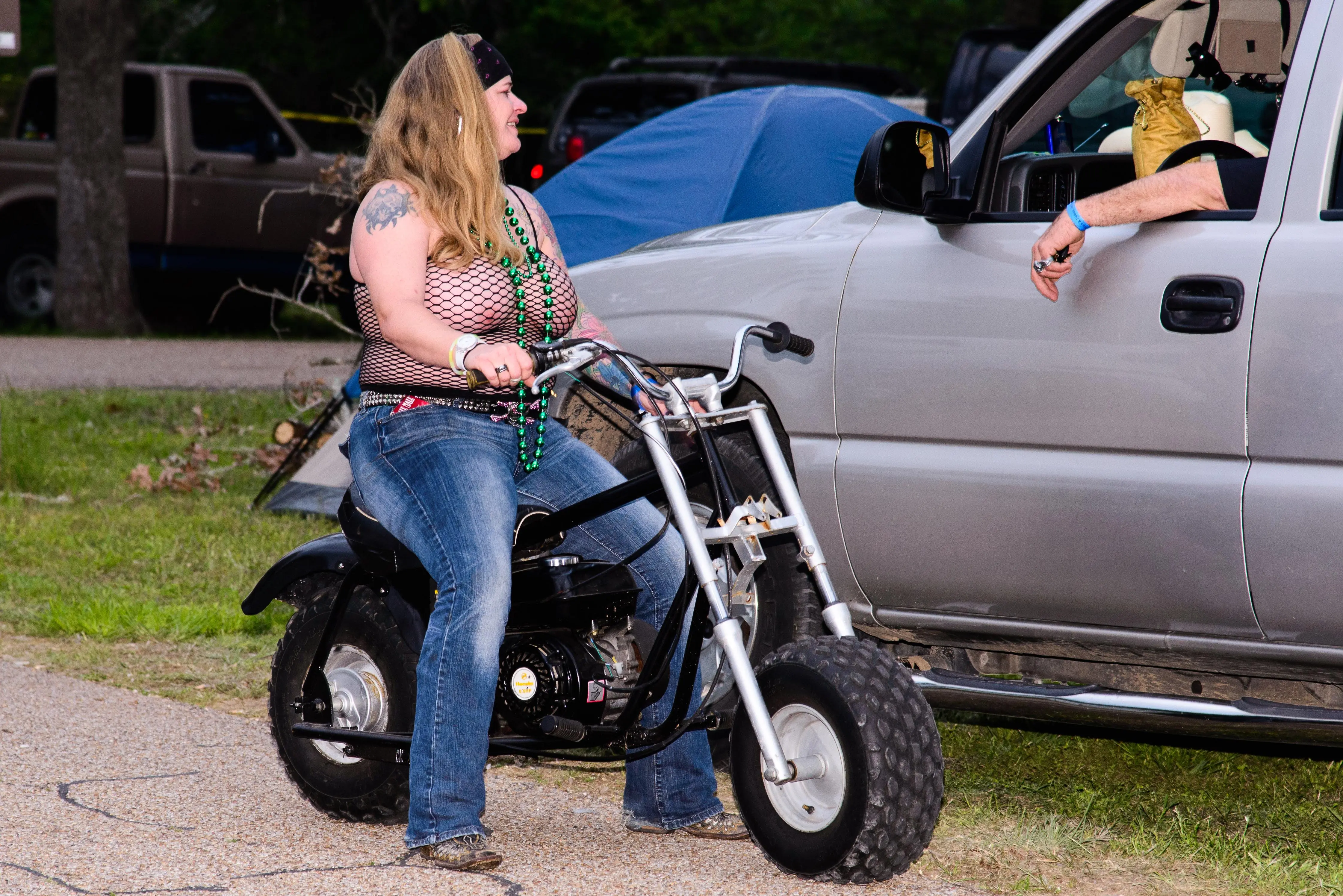 Mama's out puttin' around on her hog...