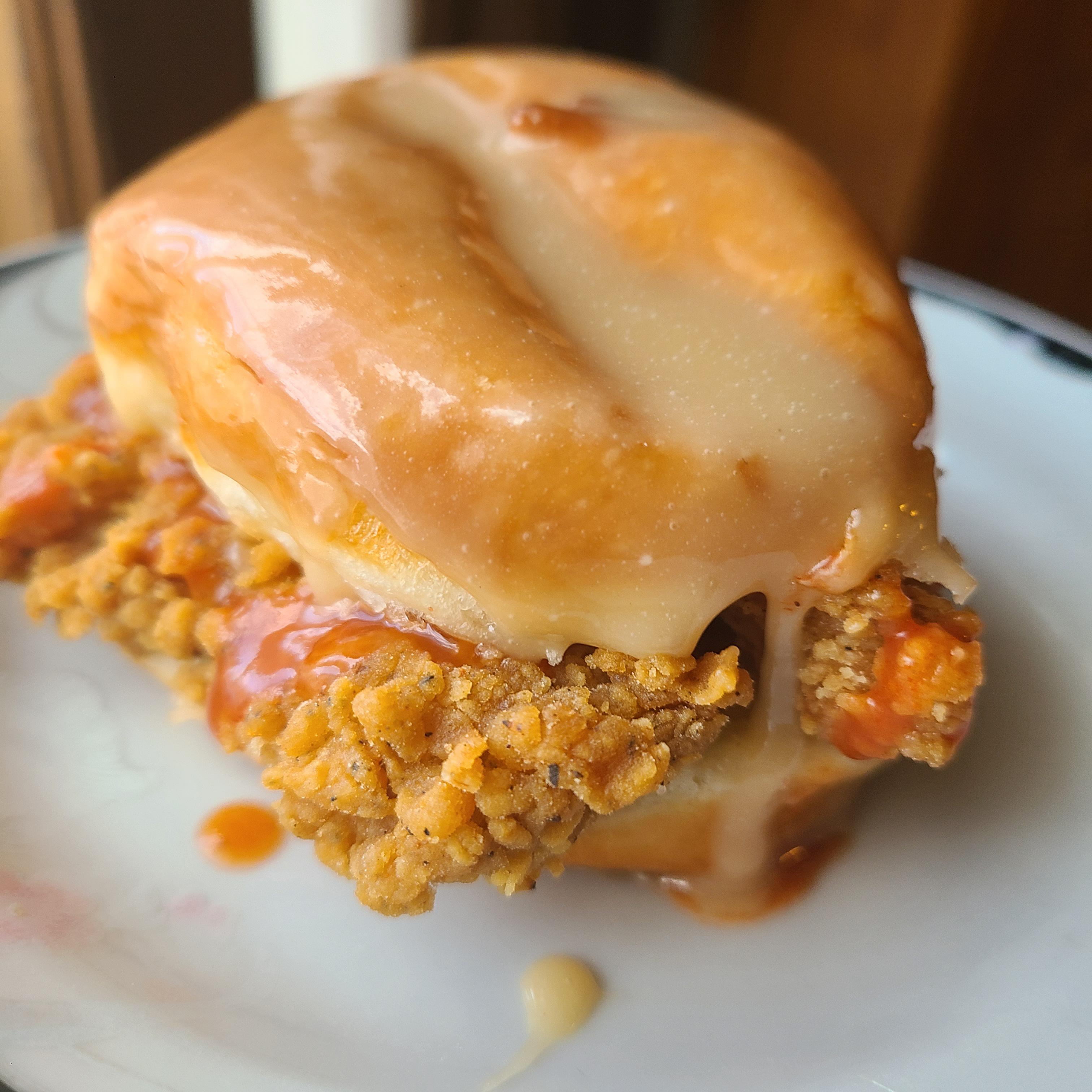 Maple glazed donut fried chicken sandwich with franks! Scrolller