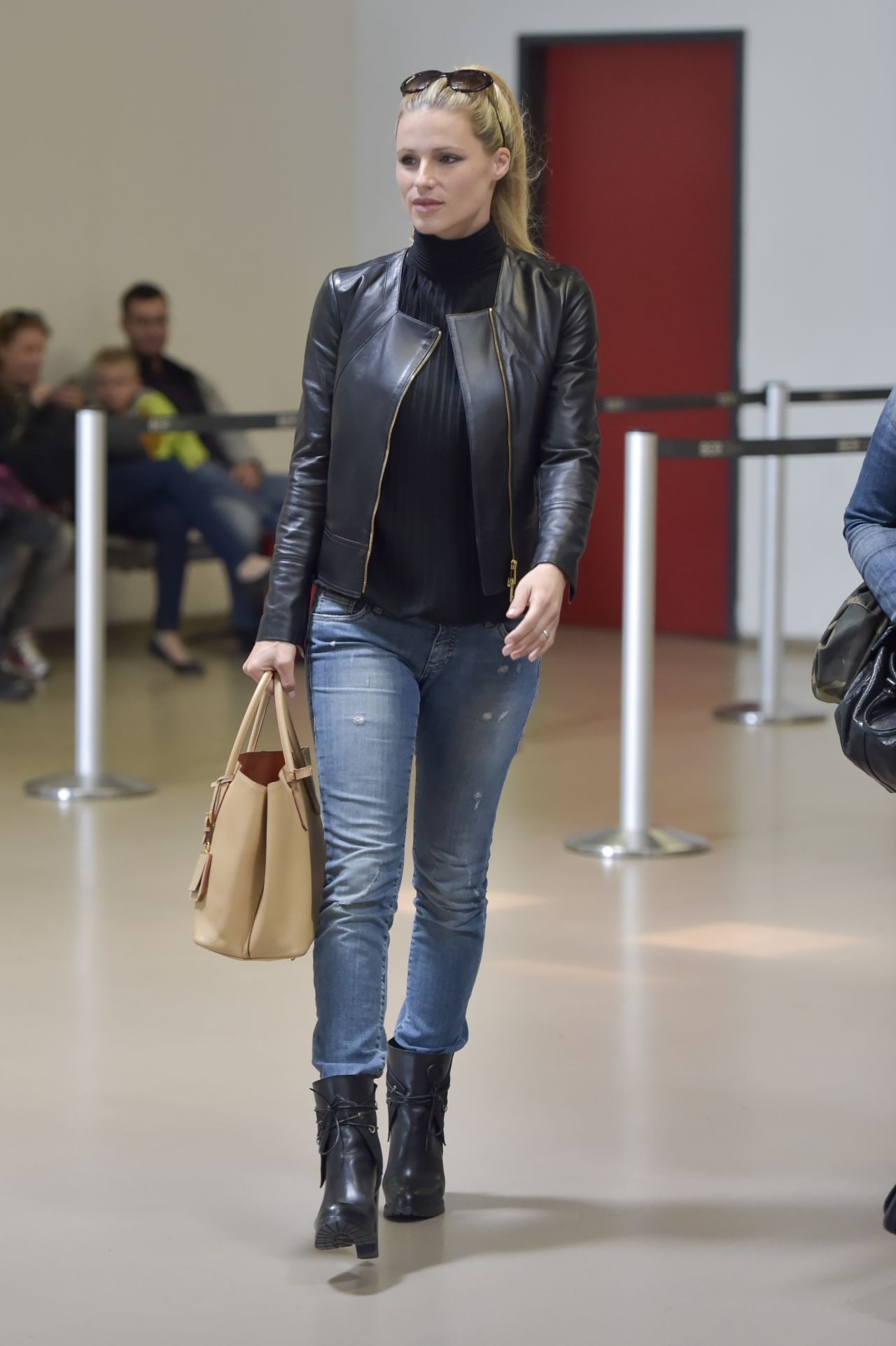 Michelle Hunziker – Catches a Flight From Berlin Tegel to Milan, May