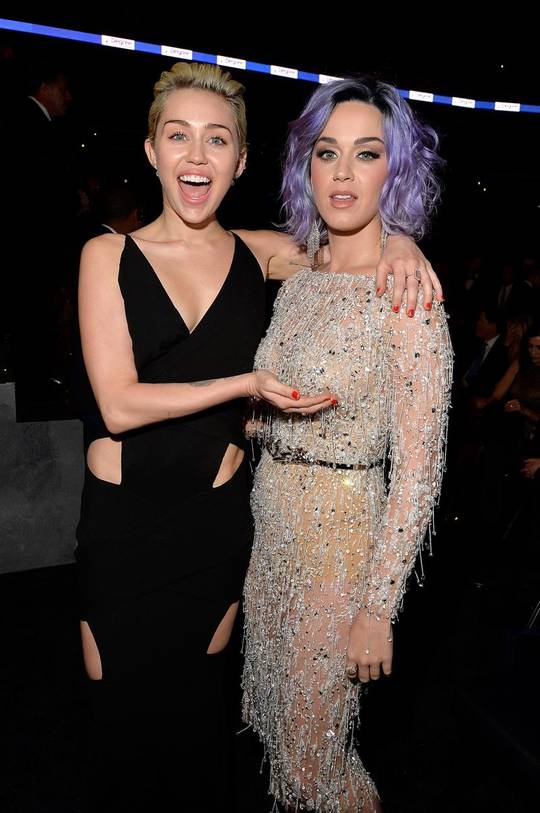 Miley Cyrus can't keep her hands off Katy Perry