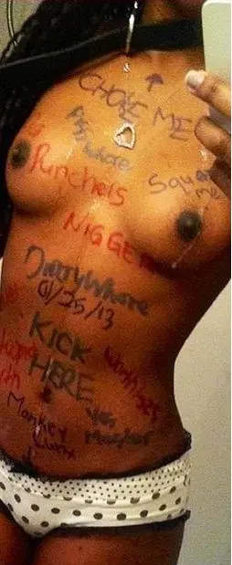 Mixed raceplay body writing and signs featuring Black and white women from JesusRaves