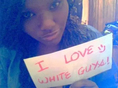 Mixed raceplay body writing and signs featuring Black and white women from JesusRaves