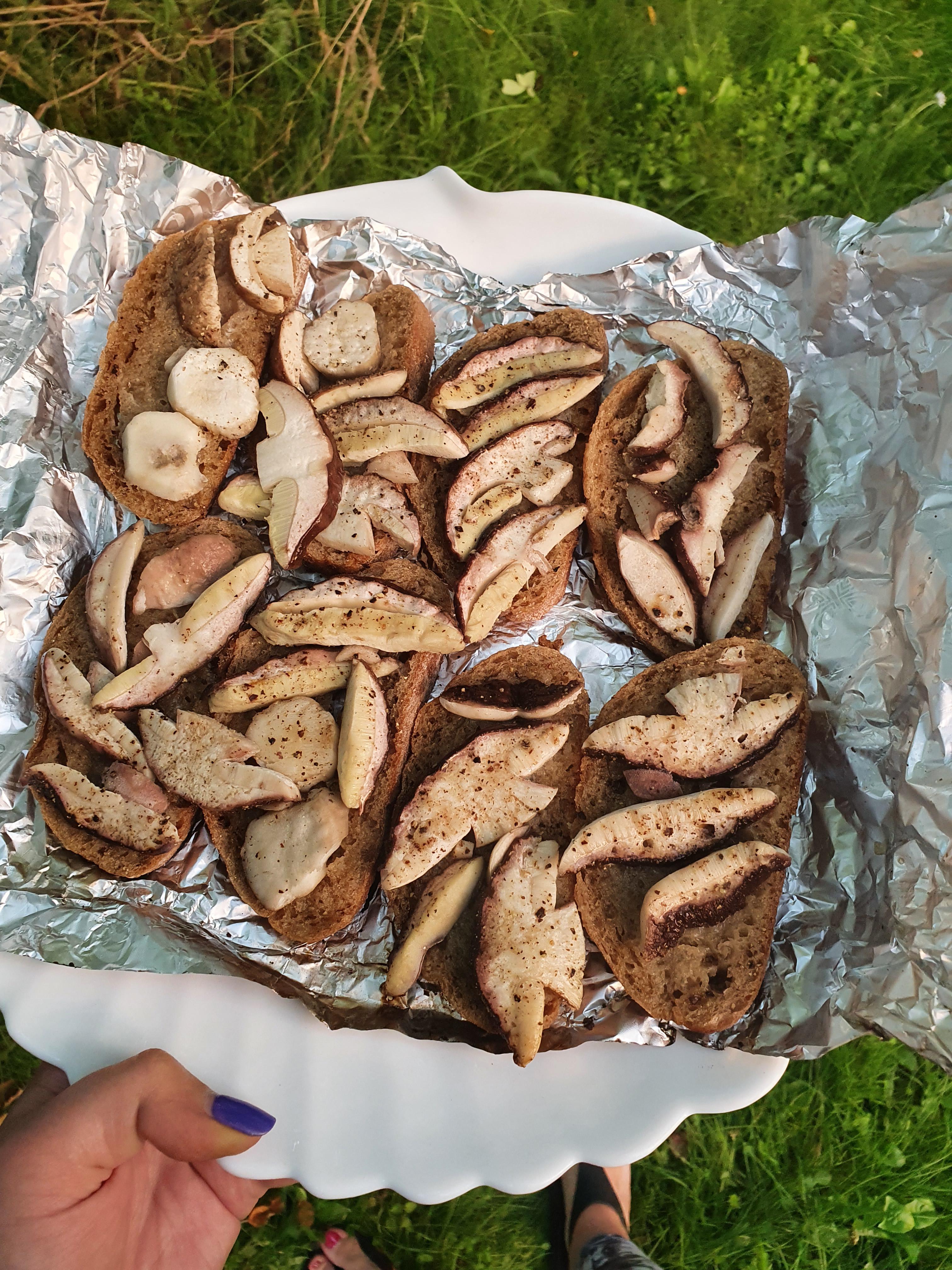 Porcini mushrooms with toast, butter, salt and pepper made on grill. Scrolller