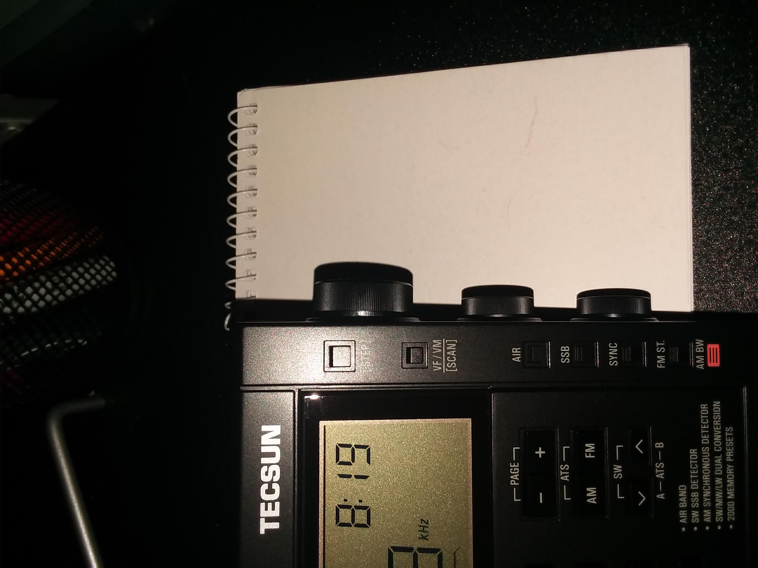 Radio tuning knob bent at slight downward angle ? Scrolller