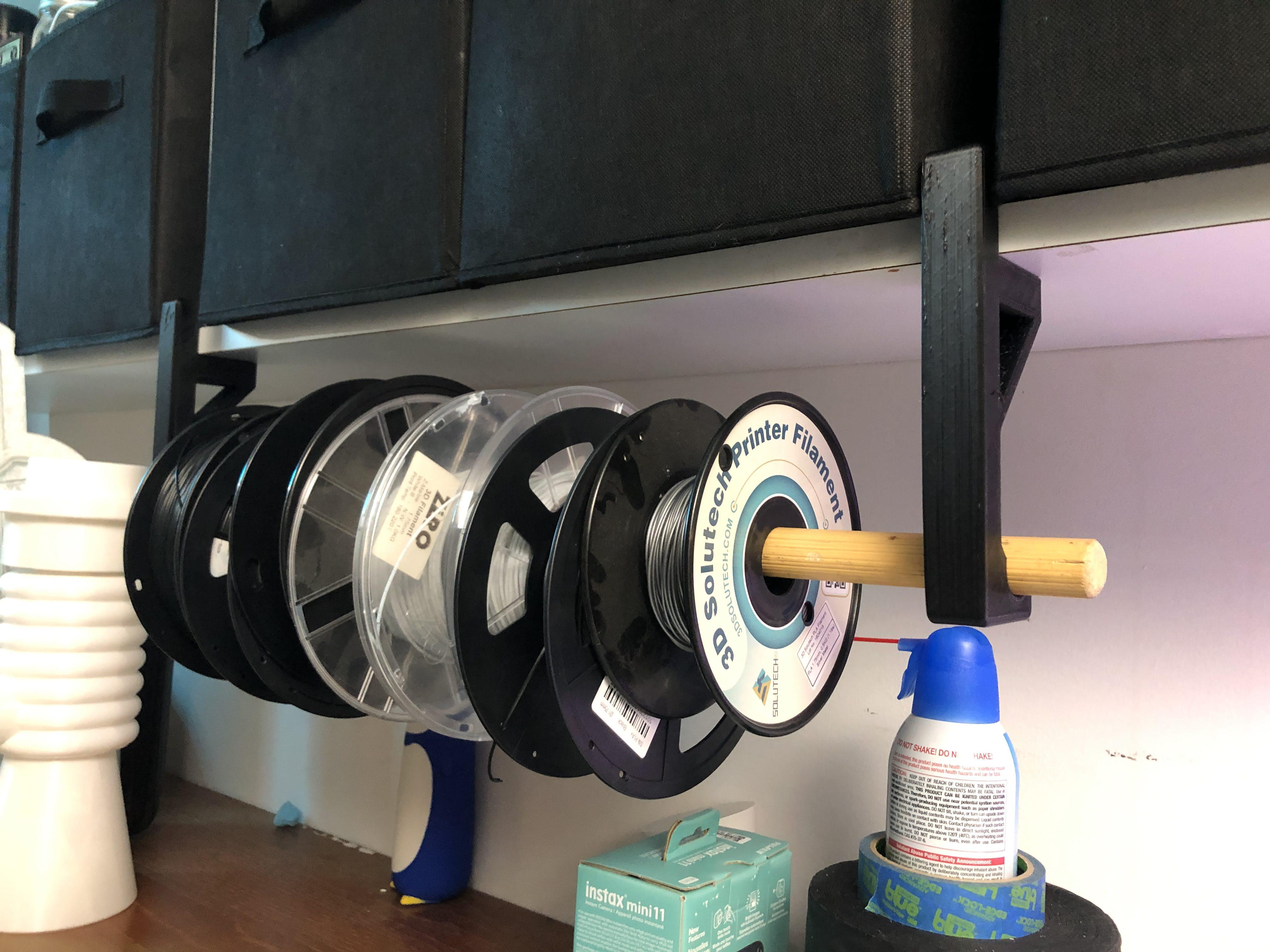 Repurposed stick to spool holder | Scrolller