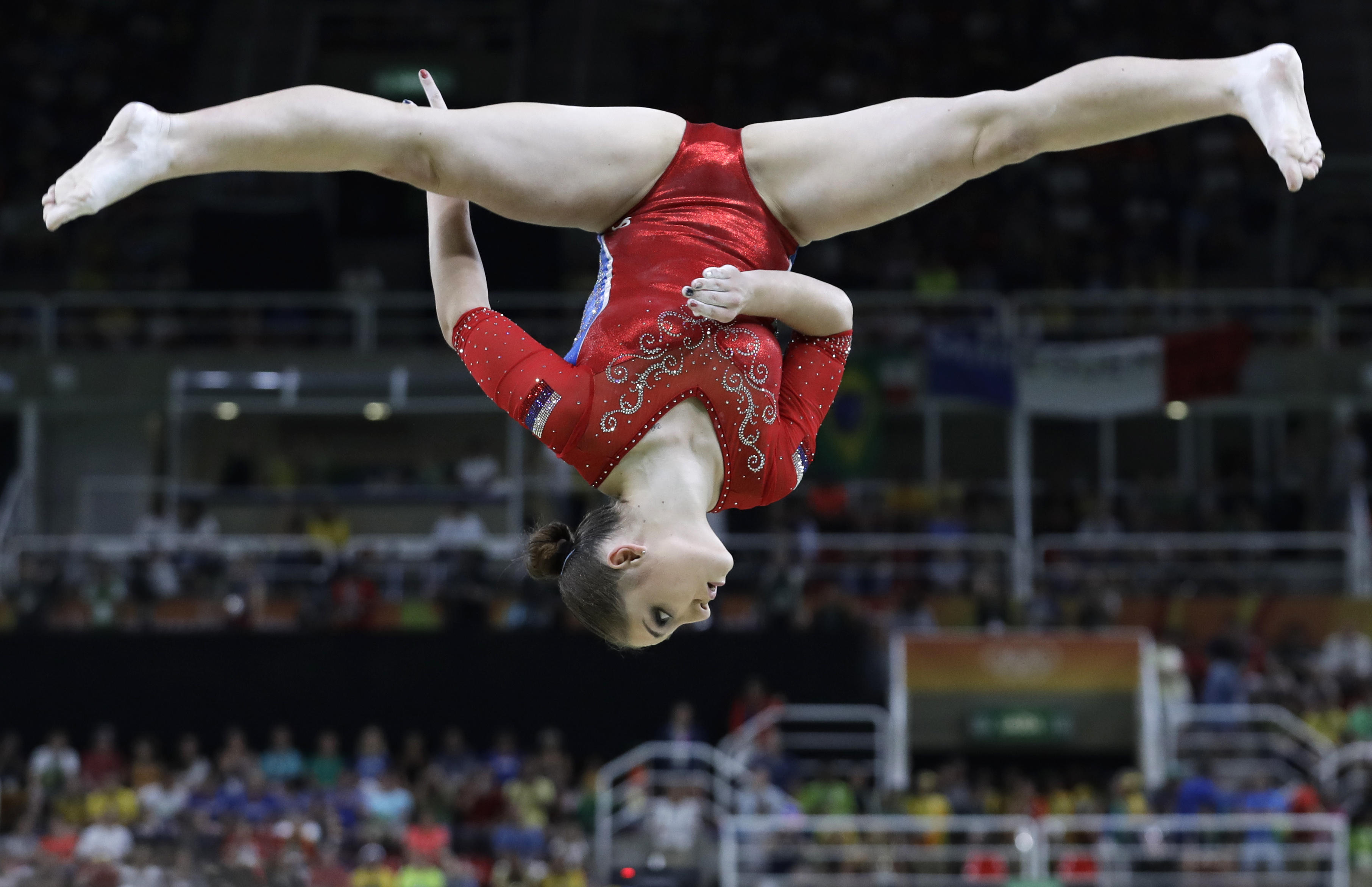 Russian gymnastics Aliya Mustafina doing the splits | Scrolller