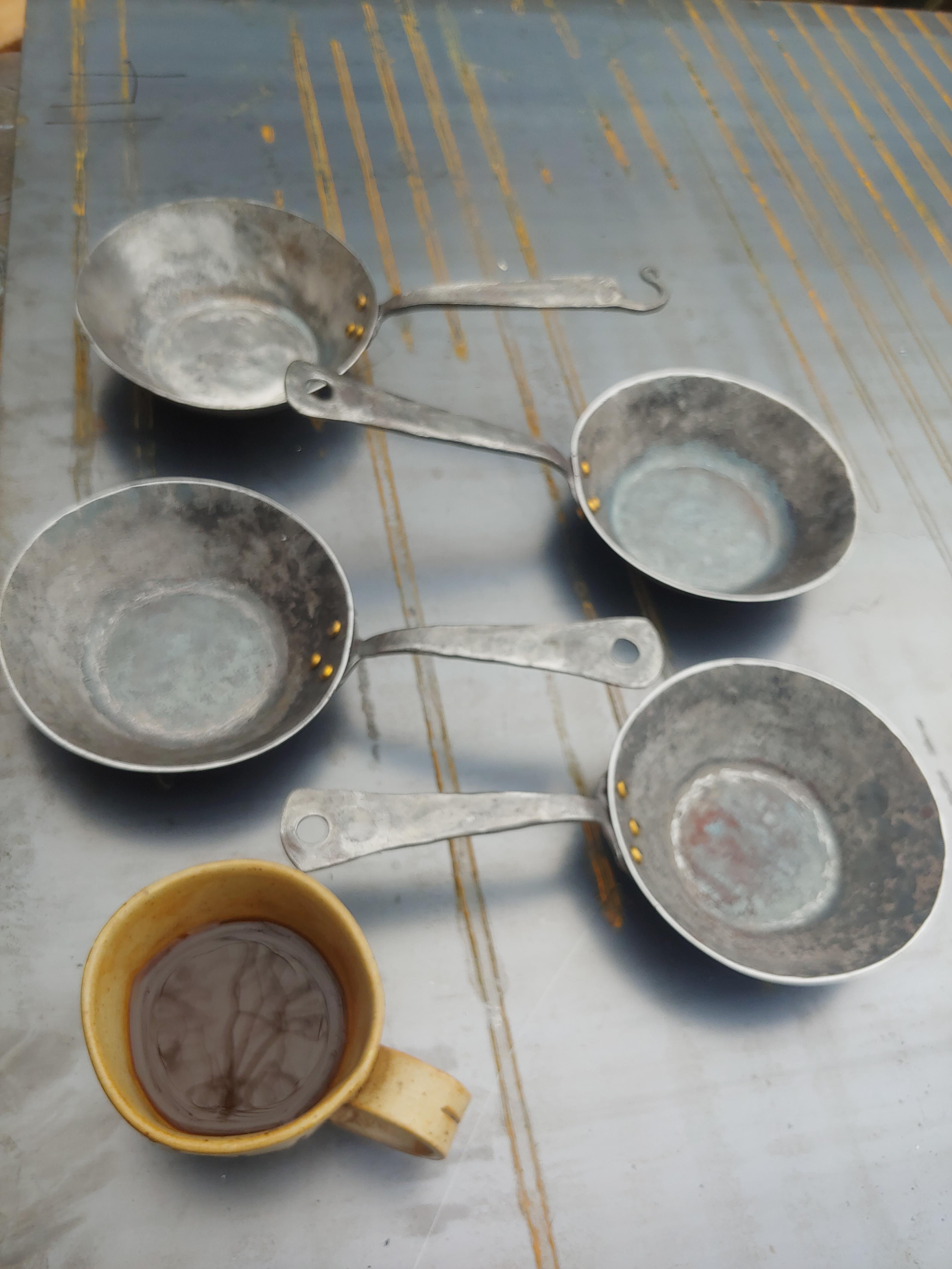 4 small sauce pots. 14 gauge carbon steel. 6 inches across the top and