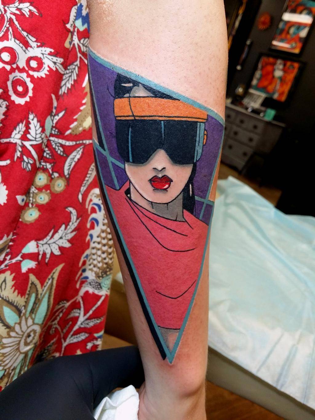This Rad tattoo of Patrick Nagel's work by Steve Rieck fits here ...