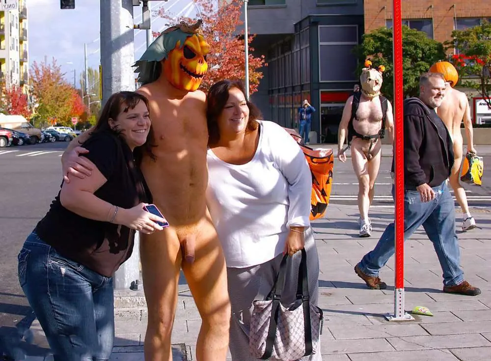 Time for some masked public CFNM at Halloween - to the delight of these ladies.