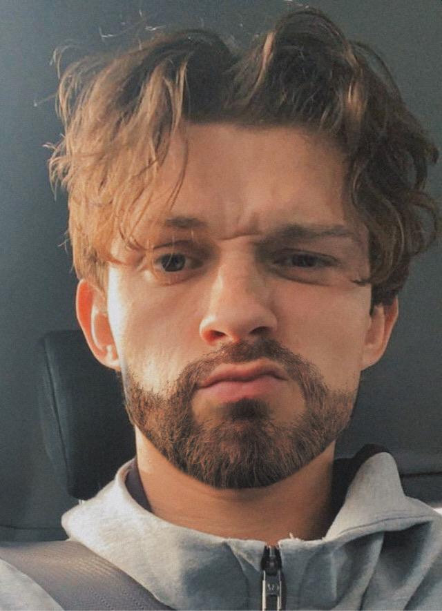tom-holland-with-a-beard-scrolller