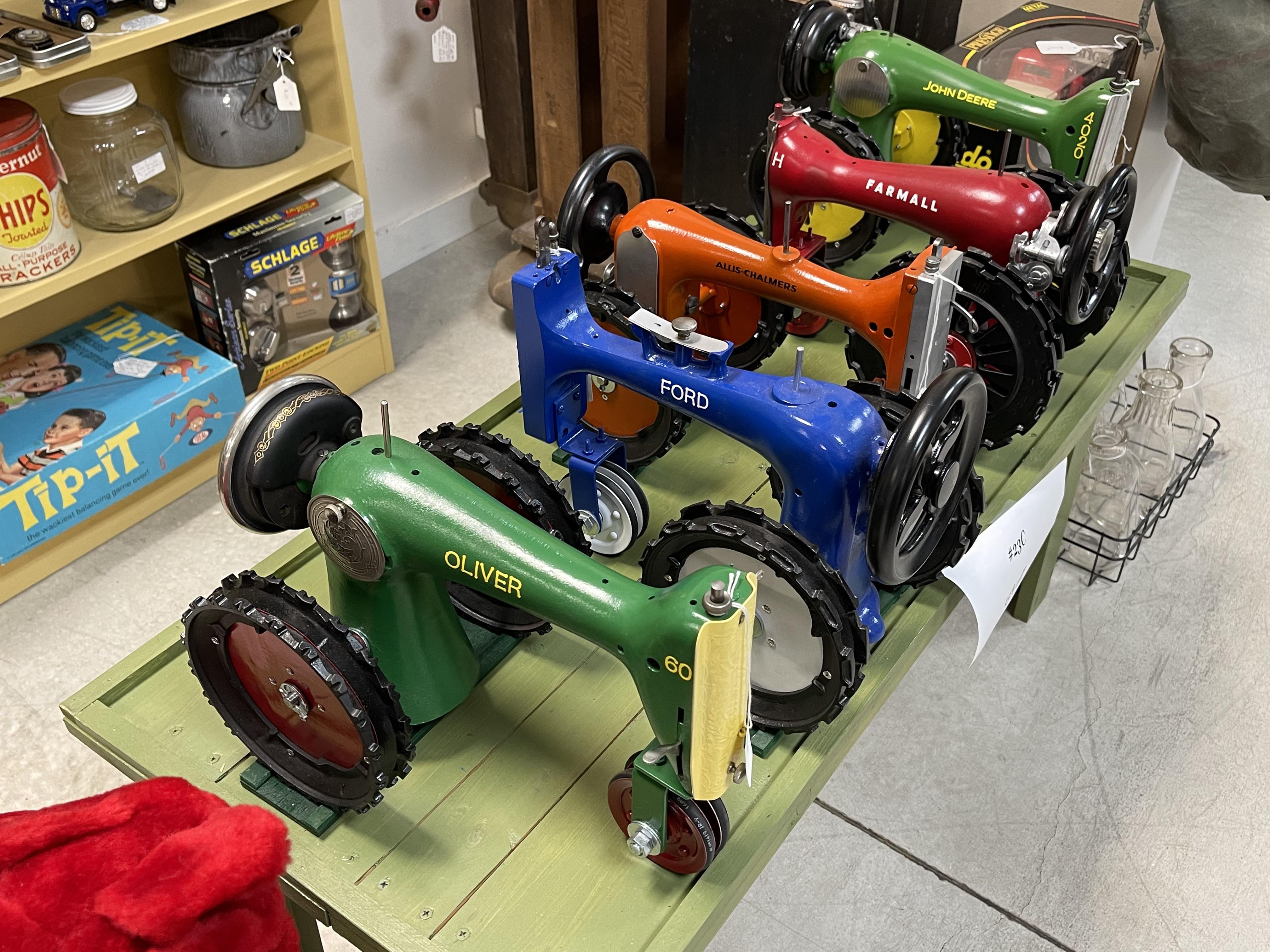Tractors made out of old sewing machines. Scrolller