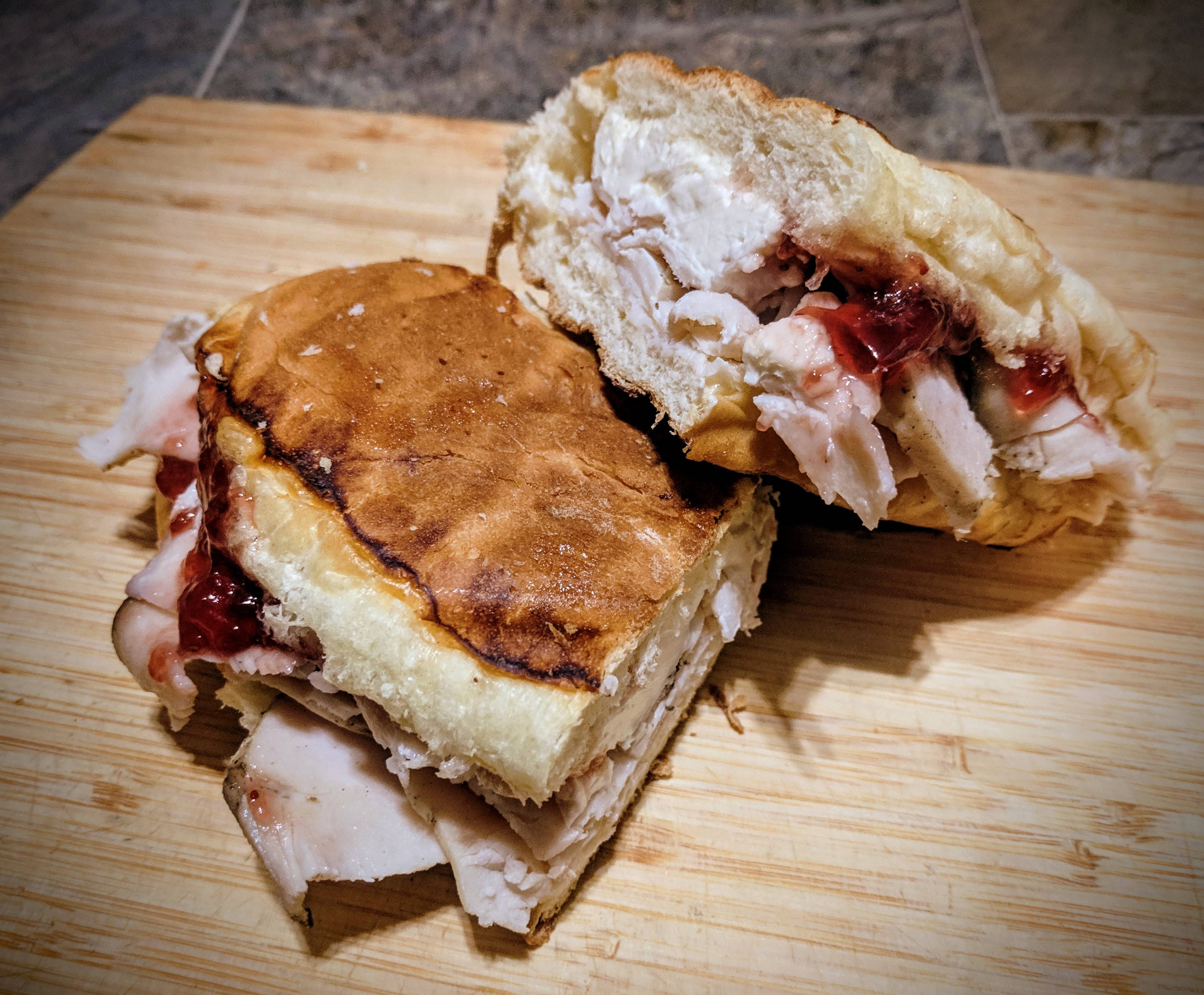 Turkey, cream cheese and strawberry jam from my local Cuban spot. So