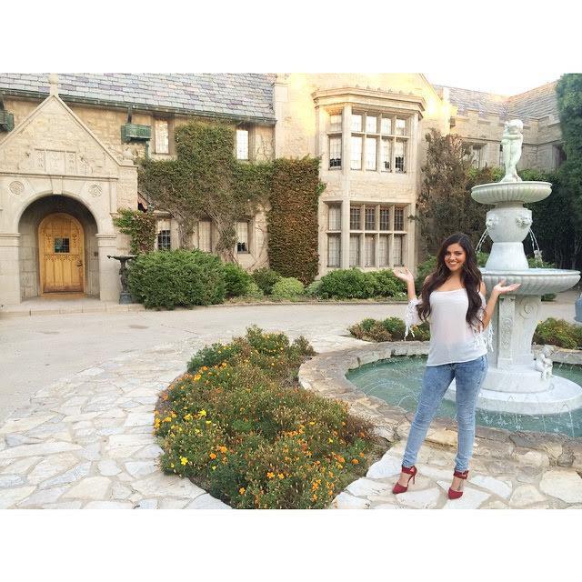 Val in front of the Playboy Mansion Scrolller
