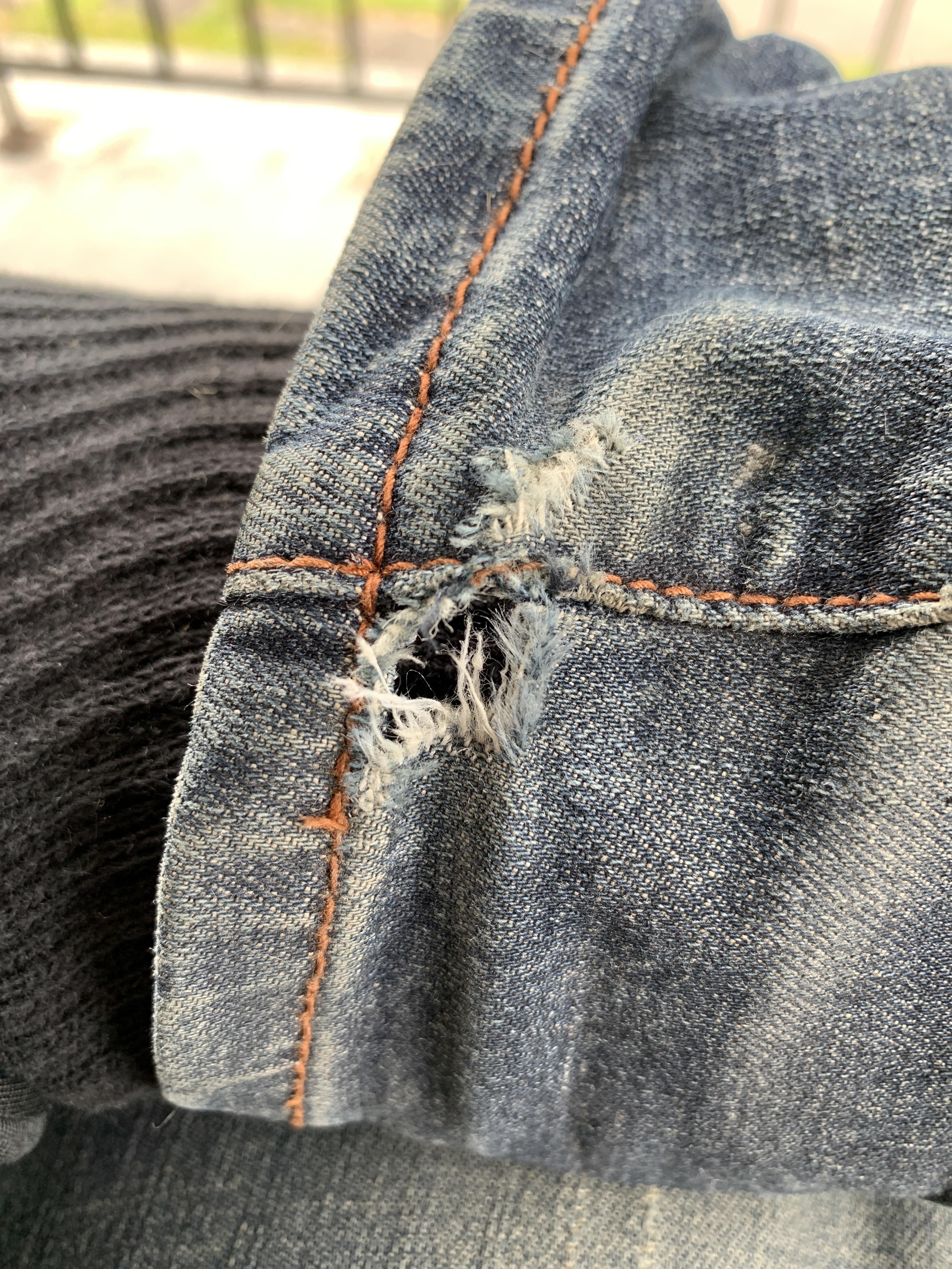 What causes holes in this spot? All my pants have holes like this. Scrolller