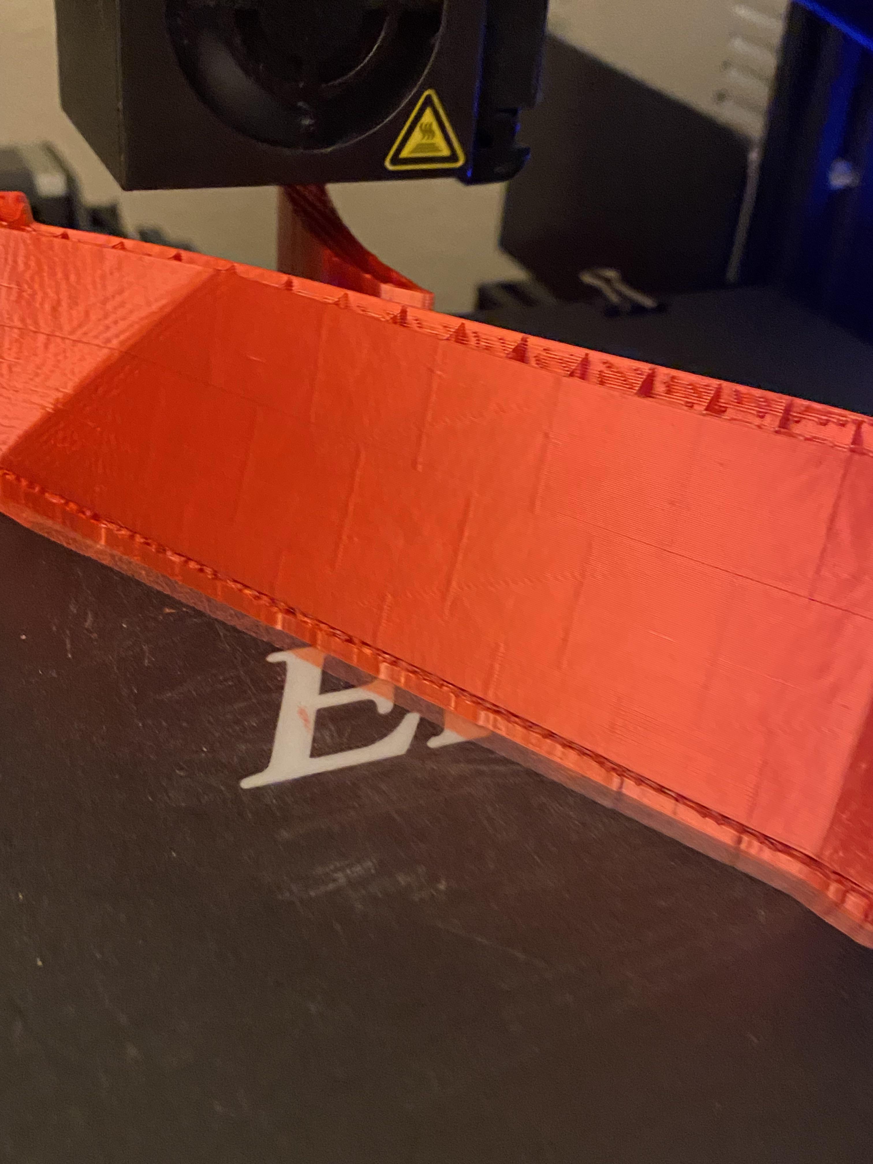 Why does my print have this bricklike design showing through? Scrolller