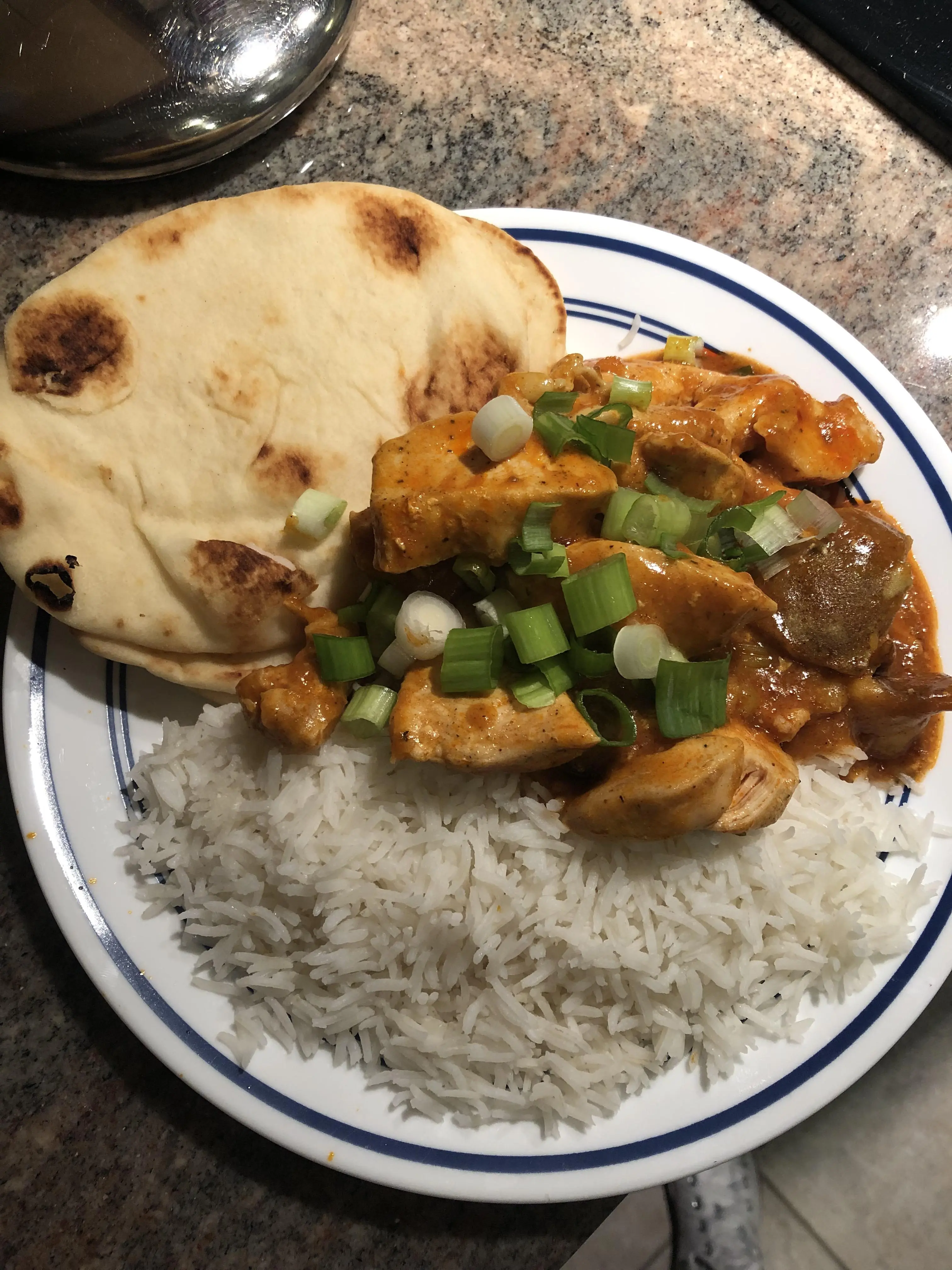 100% Aldi dinner. Butter chicken with basmati rice and naan bread ...