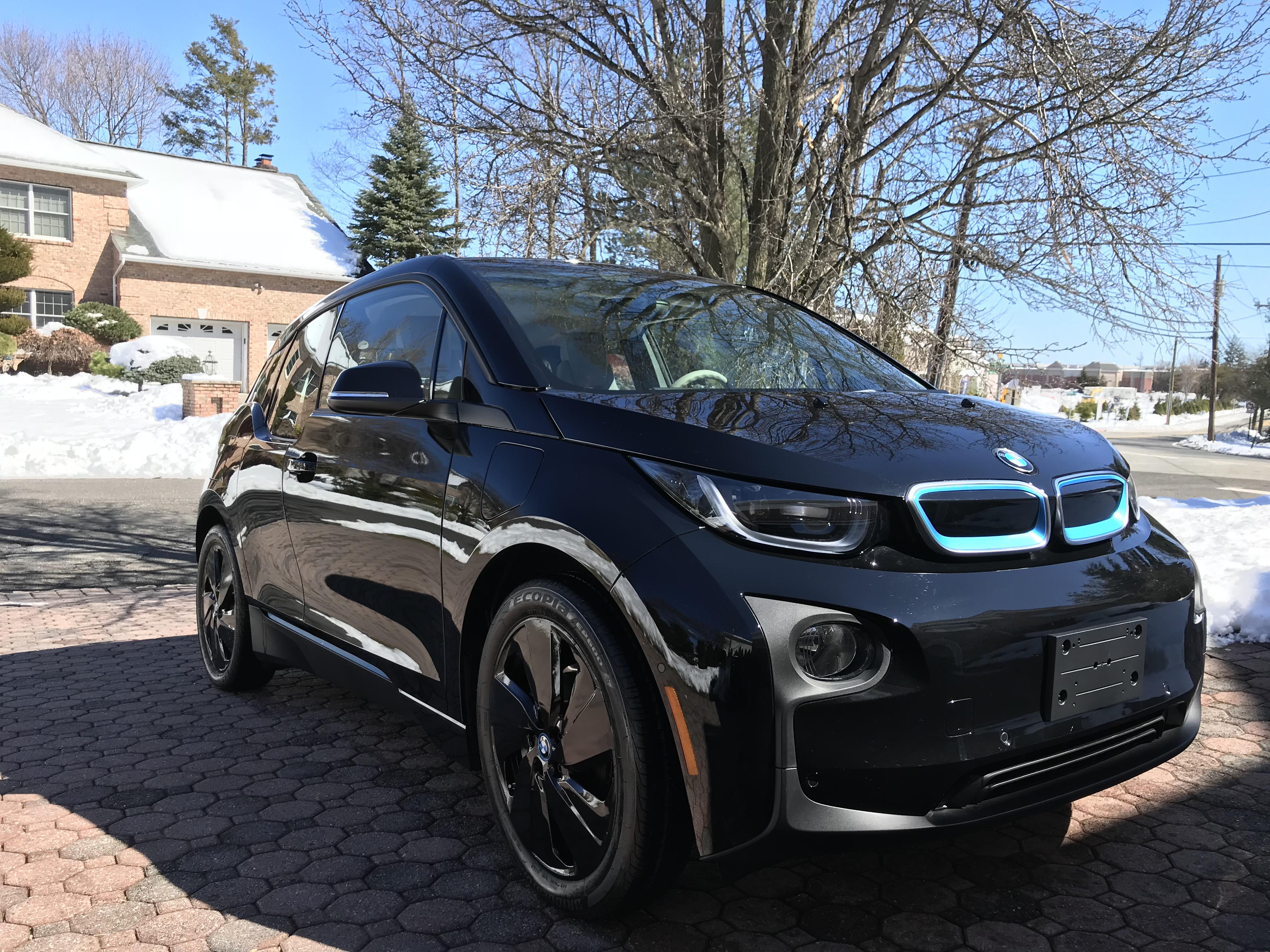 19” wheels wrapped in gloss black | Scrolller