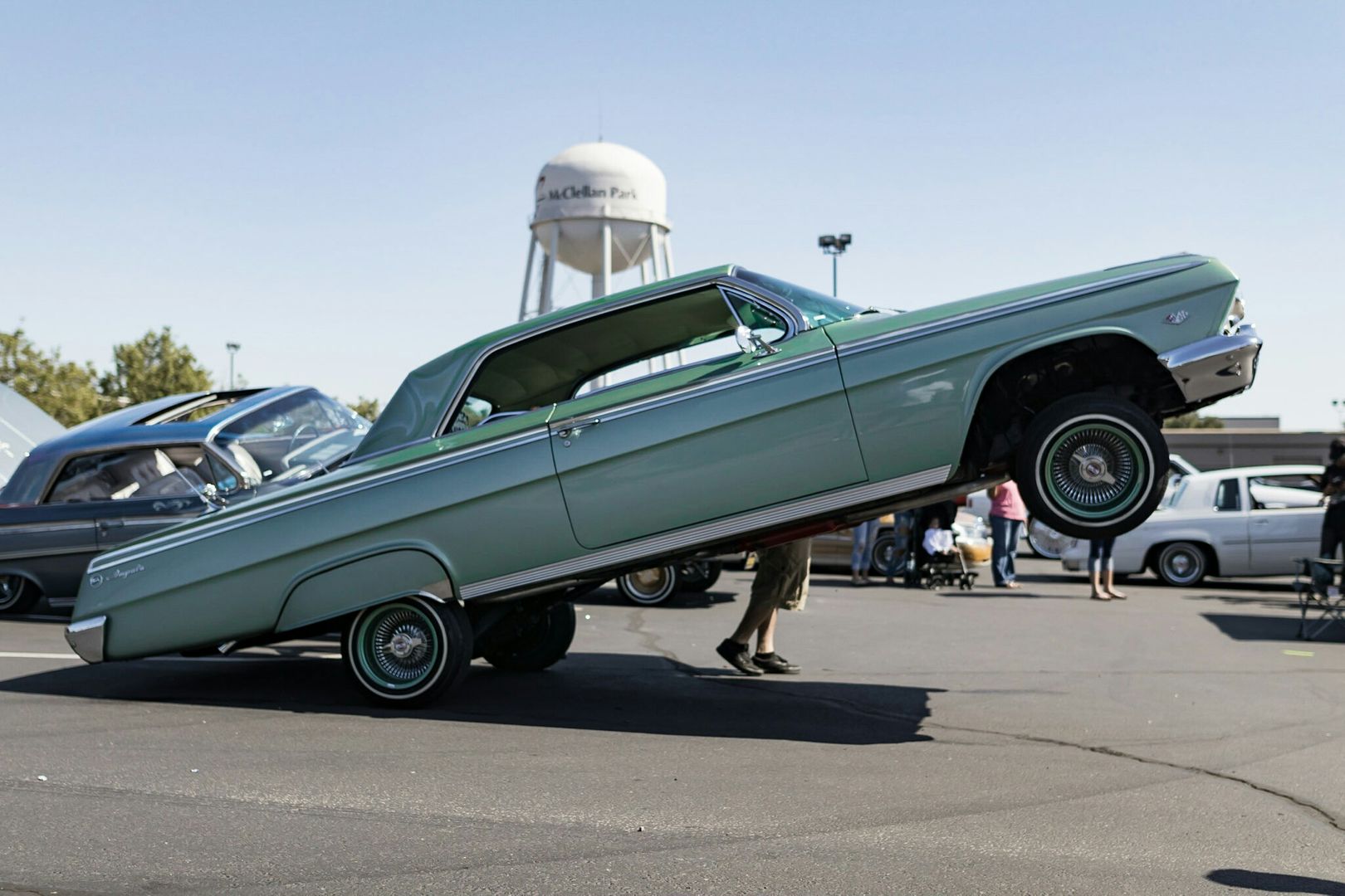 1962 chevy impala showing what it's got out at a local car show in sacramento