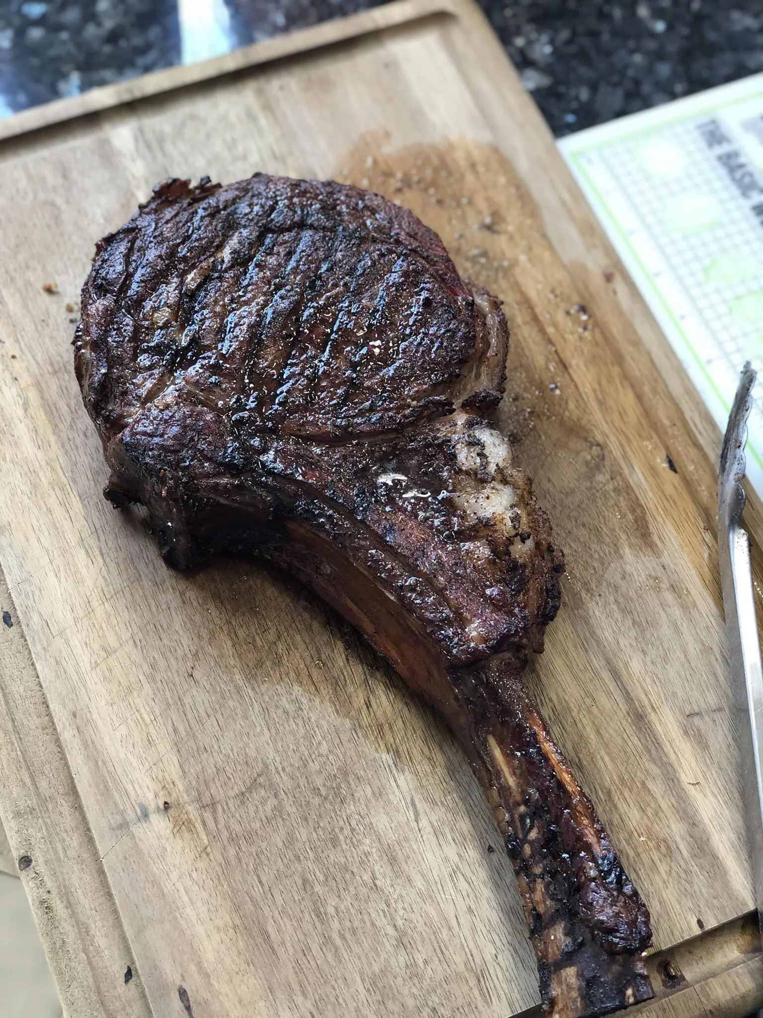 3.5 lb Tomahawk smoked on WSM then reverse seared on a charcoal chimney