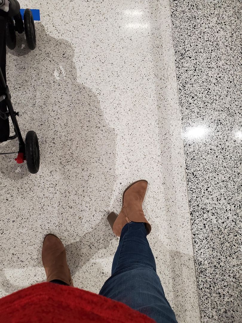 A foolish girl! Wearing heels to the airport!
