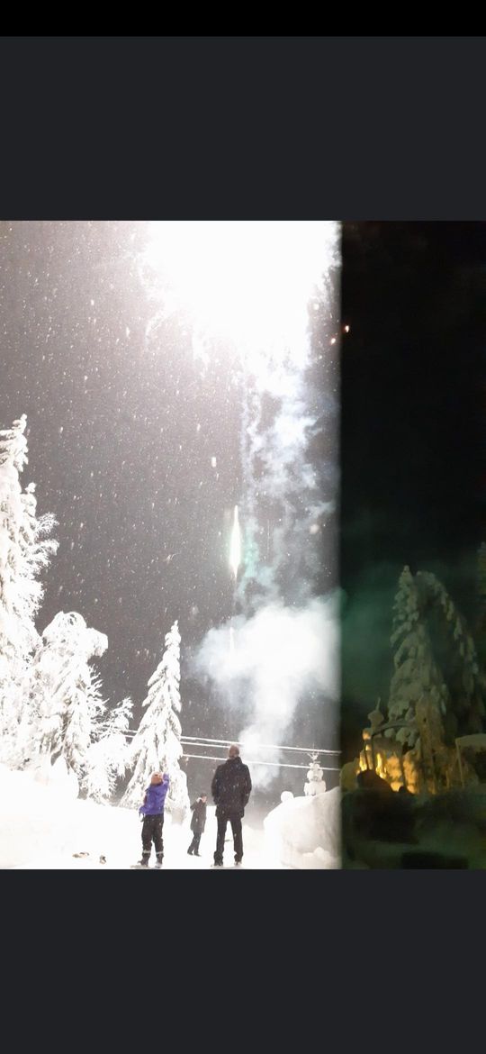 A picture taken right as a firework exploded, so it is splitt in two. The right is before the light and the left is during the firework