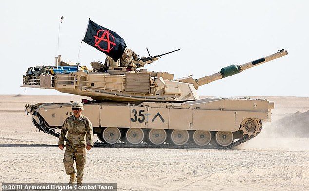 A tank unit from the 30th Armored Brigade Combat Team, a National Guard unit, was caught flying the anarchist flag and was ordered to removed it.