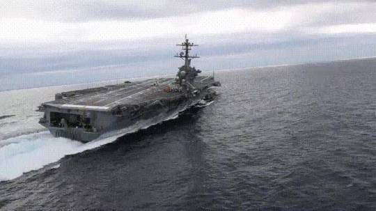 Aircraft Carrier performing a high speed turn