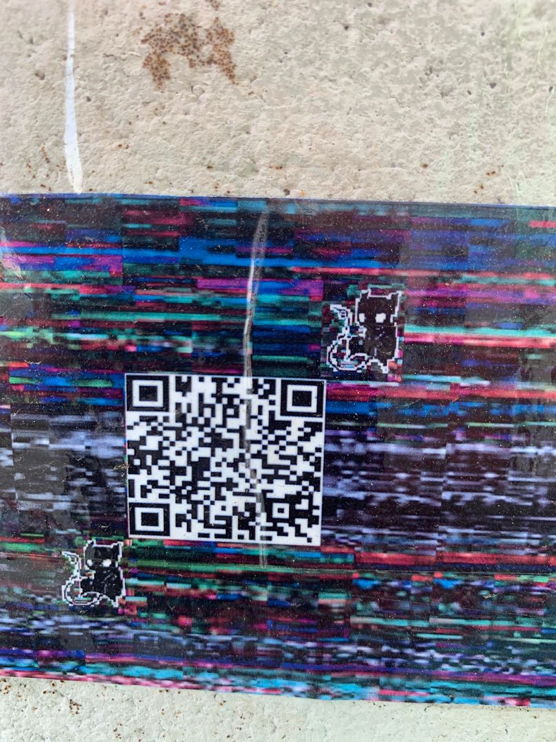 An ominous QR code was taped to the wall next to my apartment complex. I’m to scared scan but I’m still curious to what it leads to, the only thing I can identify is the Pokémon on the left and right corners . Has anyone else seen these around?