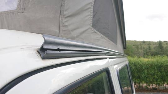 Anyone know what type of awning rail this is, and what I'd need to do/buy to fit an awning like a Vango Bondi Low to it?