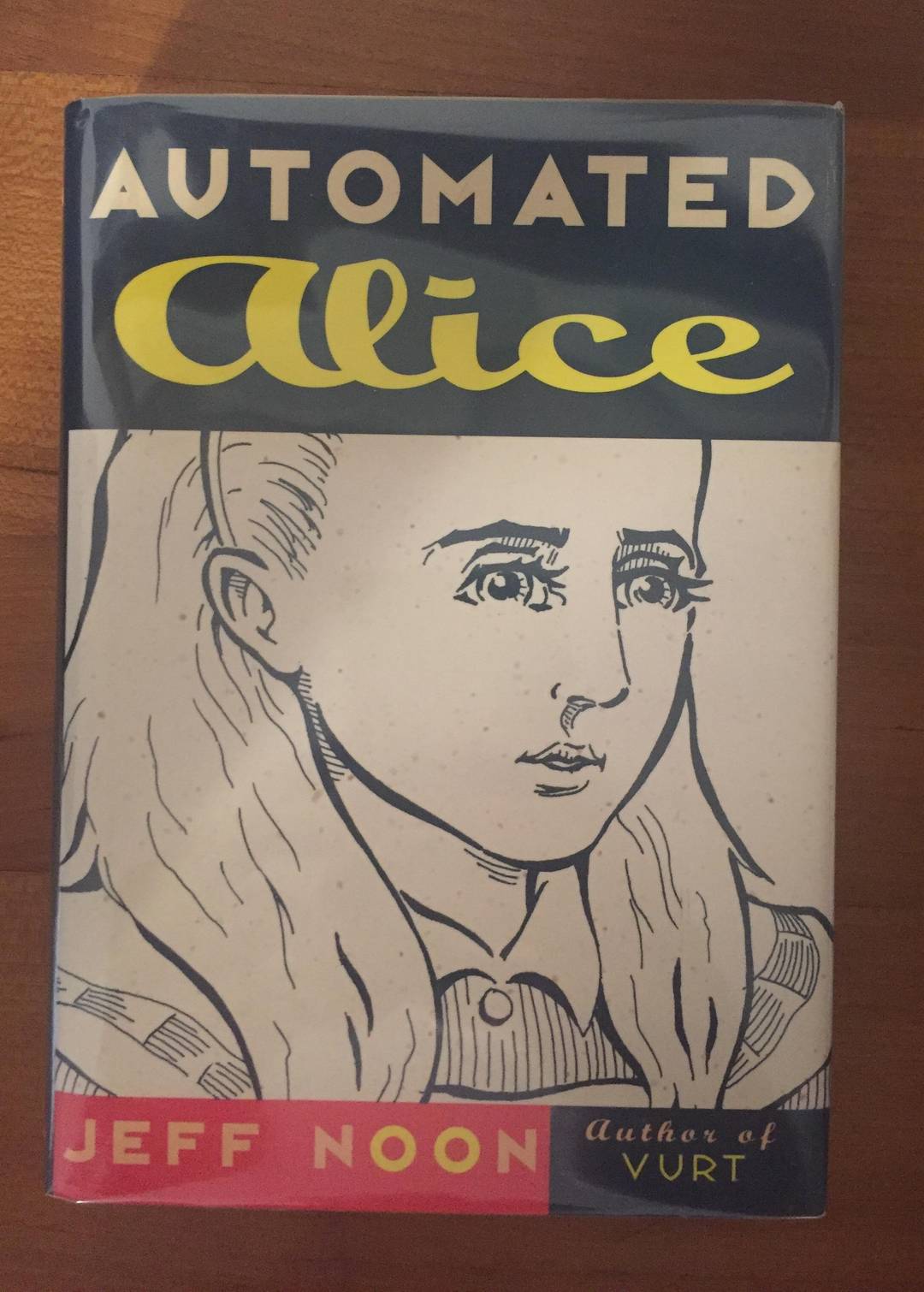 ‘Automated Alice’ by Jeff Noon, cover art by Harry Trumbore, 1996.