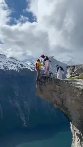 Base jumper transferring "bases" mid-air