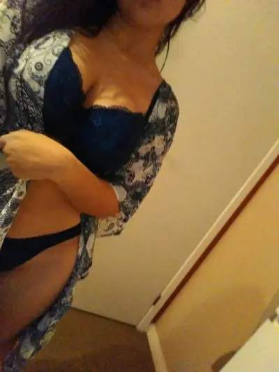 Canada desi babe in a grey shirt and blue lace lingerie posing for selfies