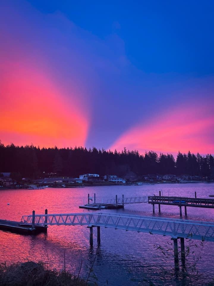 Caught our beautiful Mt. Rainer casting its shadow across the pink morning sunrise.