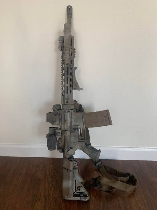 Colt M4 w/ LaRue Furniture and Eotech Optics. Judge me!