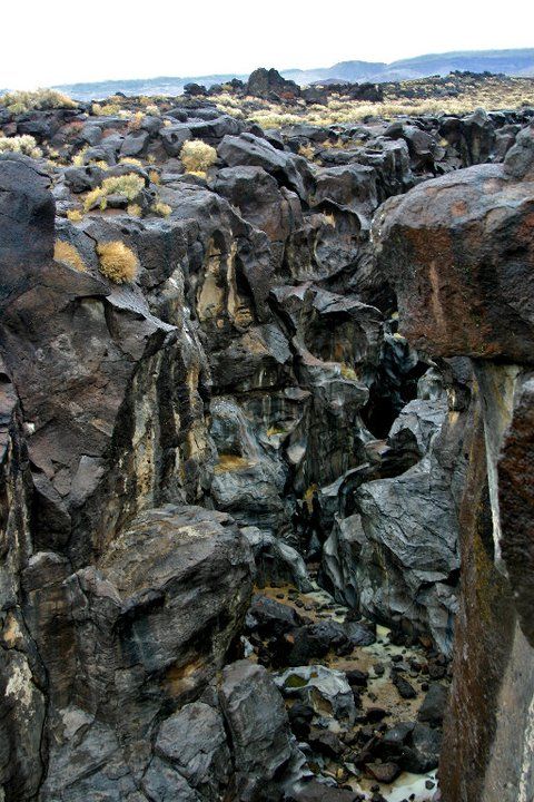 Crazy rock formation in the high desert: Fossil Falls outside of ...