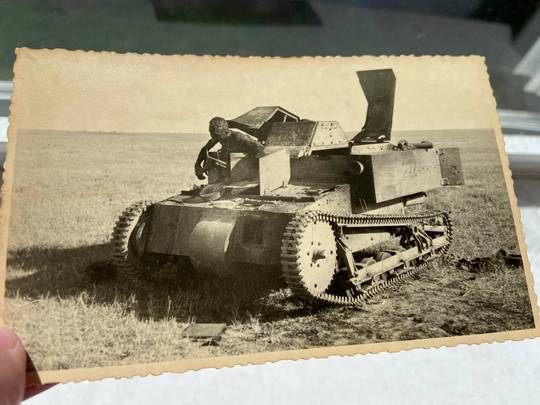 Destroyed Russian tank during ww2 with burnt remains of a soldier, photo from my collection
