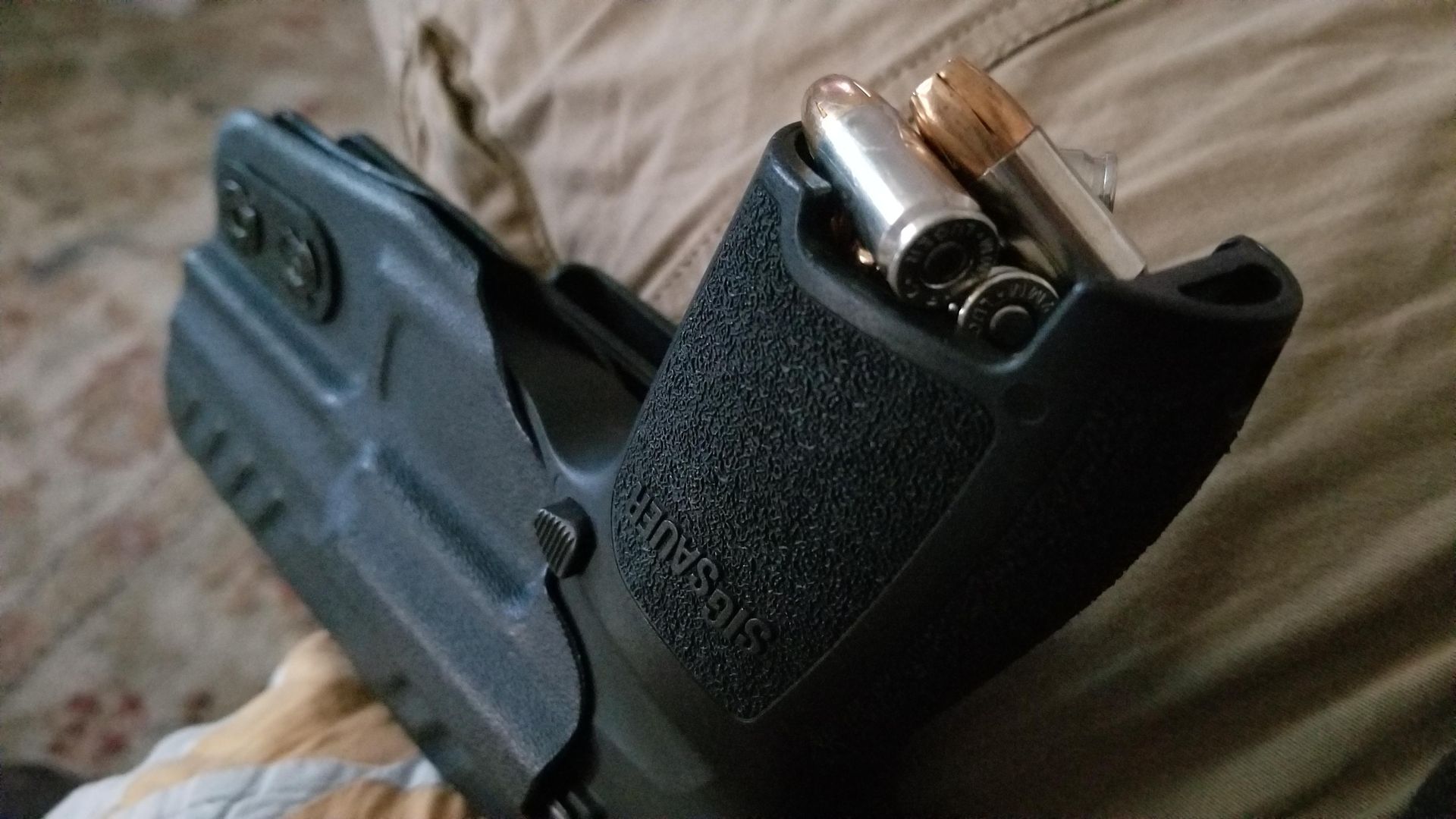 Don't let anyone lie to you, if you take the mag out of the p320C it holds 23+1. Learn to better defend you and your loved ones.