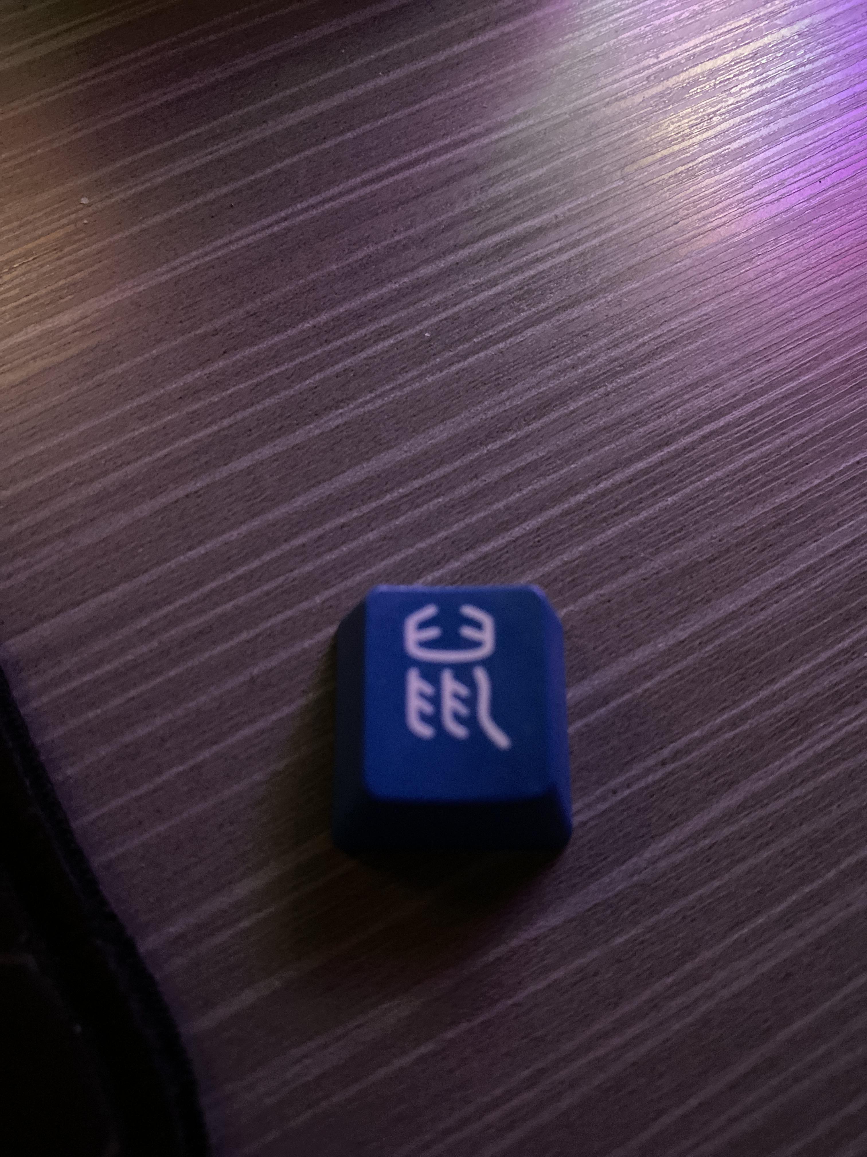 ducky-key-cap-with-symbol-on-it-what-does-it-mean-scrolller