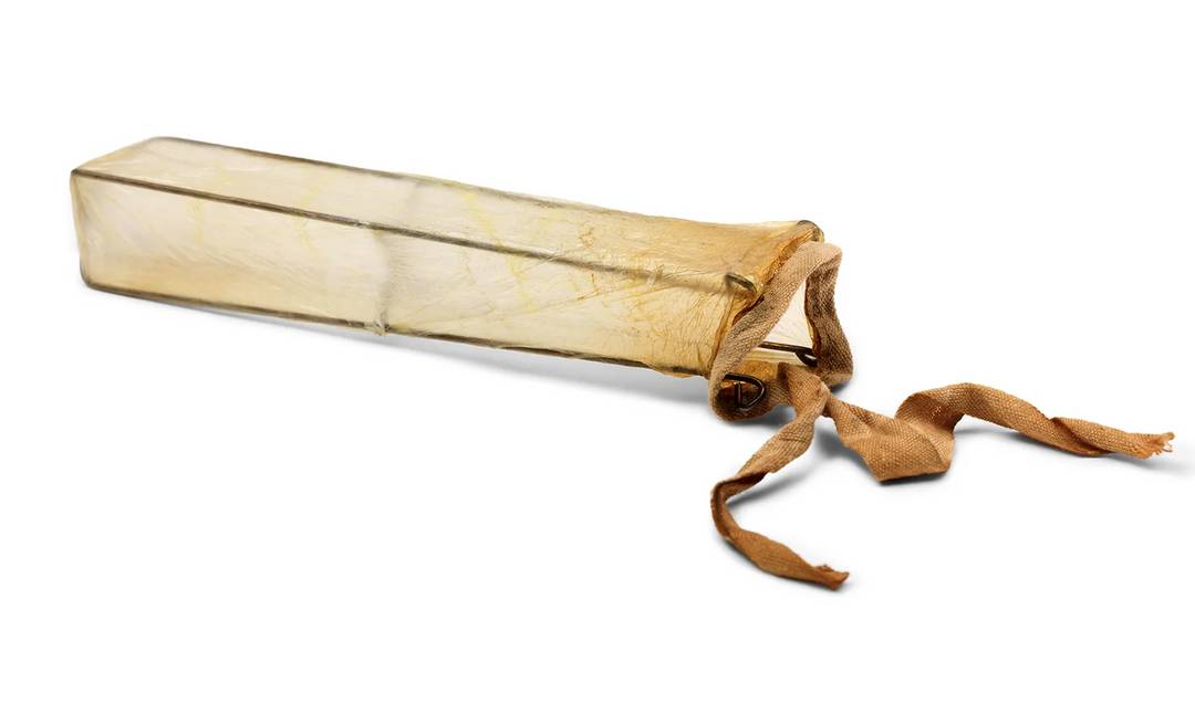 Early condoms were made using sheep intestine, like this one from around 1800.