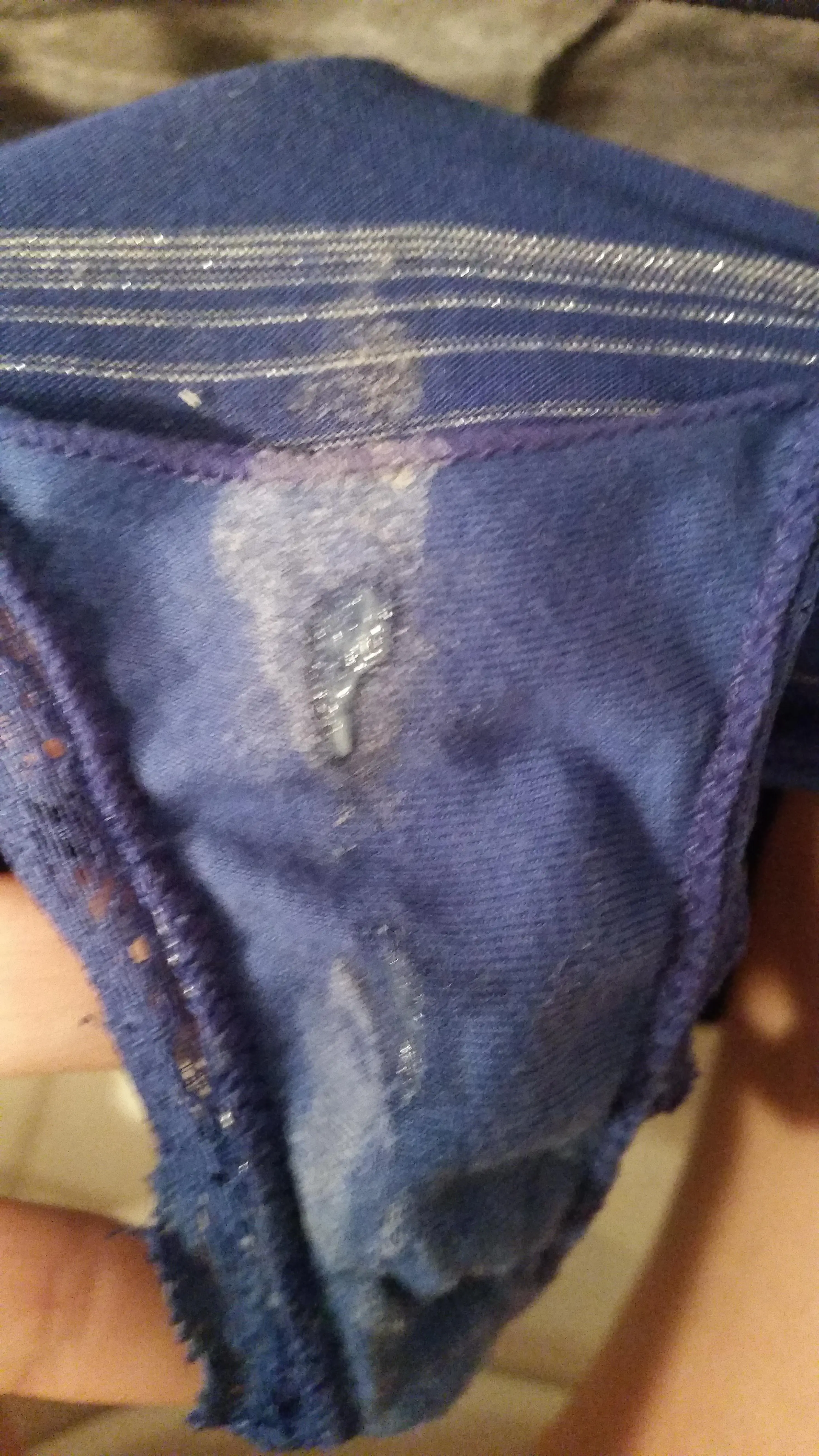 Woman showing dirty panties with wet panty nectar and underwear marks on the gusset
