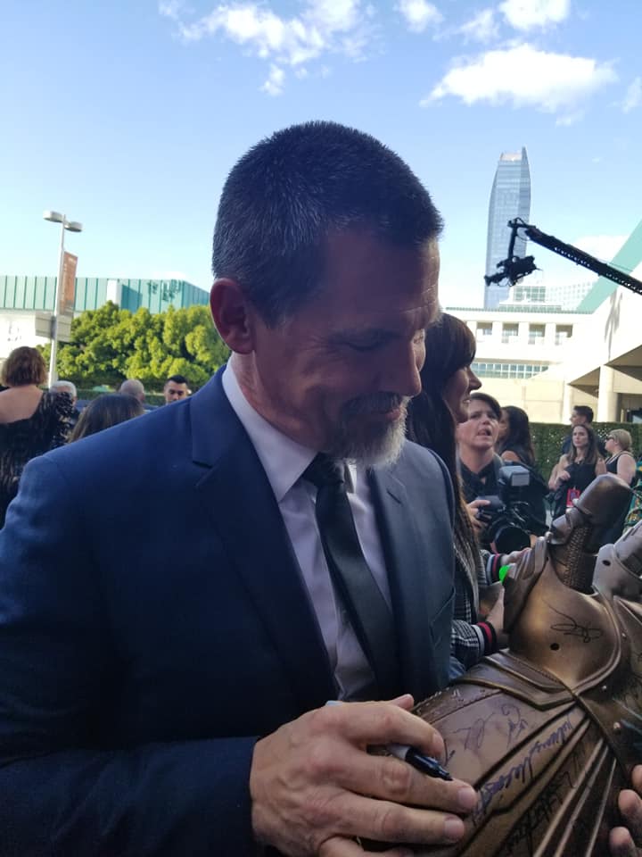 Find someone who looks at you, the way Josh Brolin looked at my signed gauntlet.