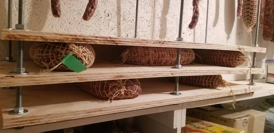 First time making my nonno's proscuittini. Cured for 3 days in readycure, cased in capicolo casing and hung to dry for 2 weeks. Now in the press they go.